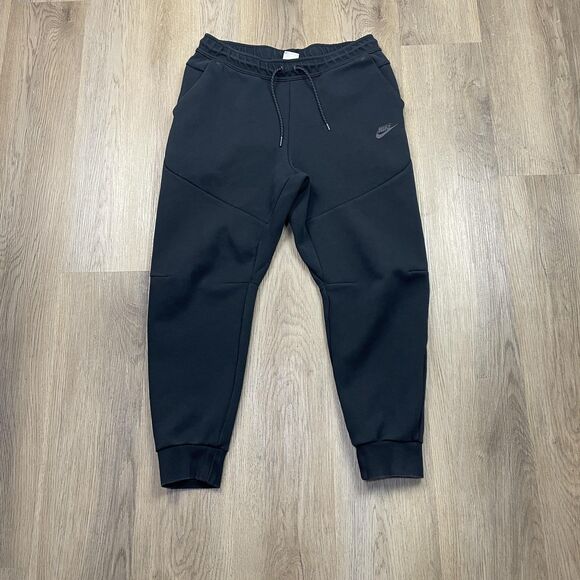 Nike Tech Fleece Jogger Pants Mens Large Black Tapered Cuffed Zip Pocket Swoosh - Picture 1 of 12